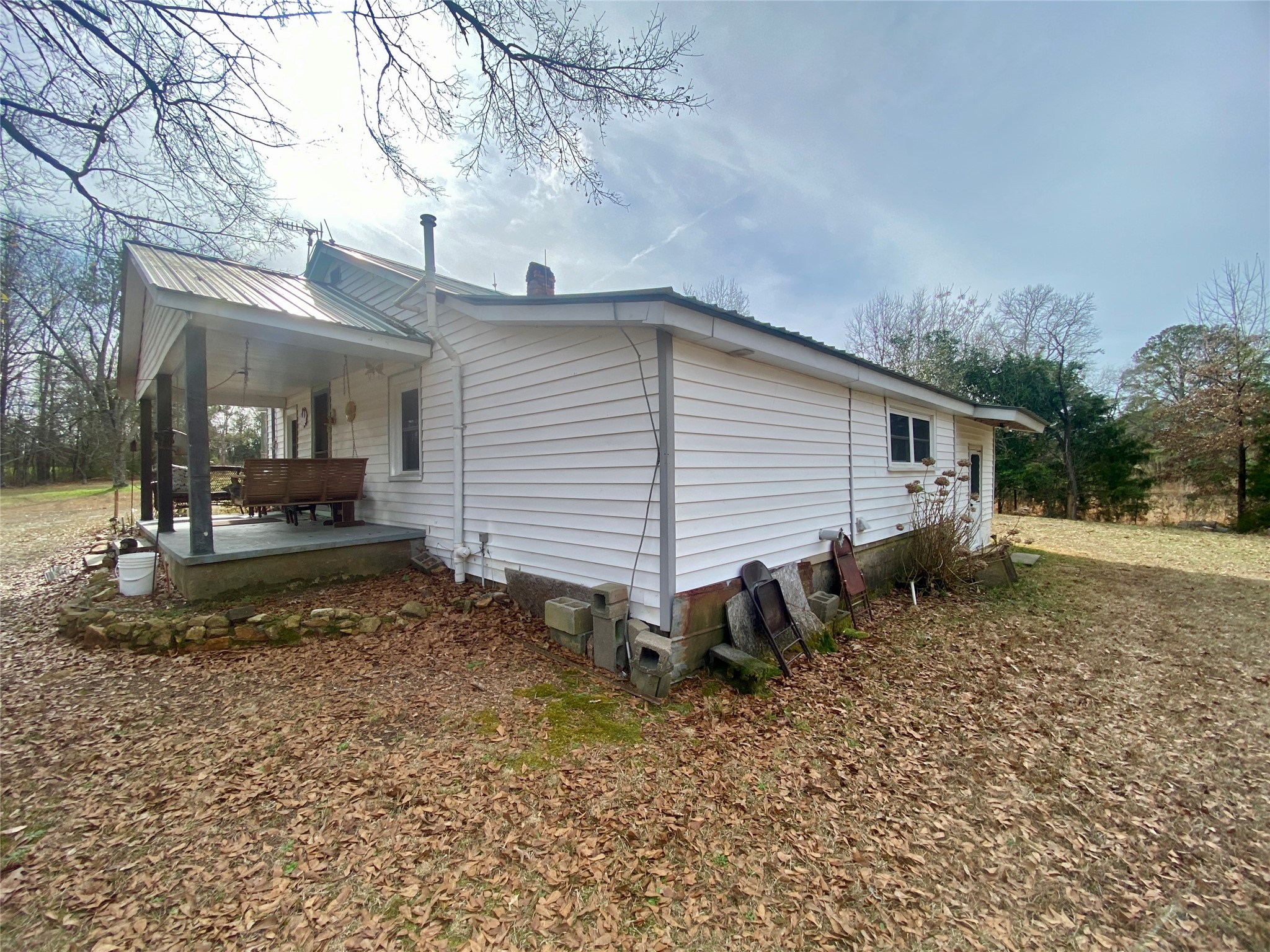 1135 Beaver Dam Road Washington, GA 30673 - Photo 22 of 42 a view of a house with a yard and a tree