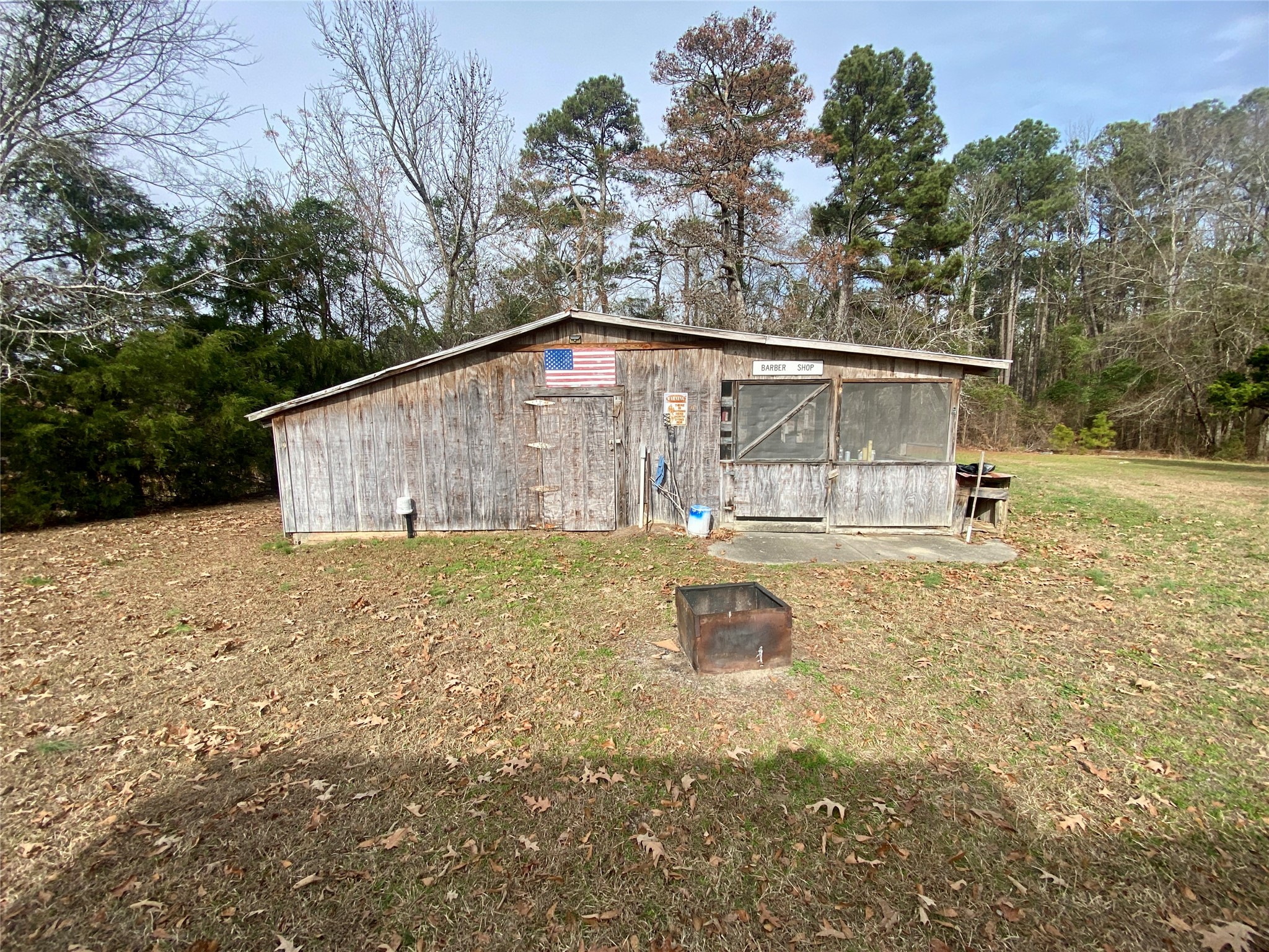1135 Beaver Dam Road Washington, GA 30673 - Photo 27 of 42 a backyard of a house with yard and trampoline