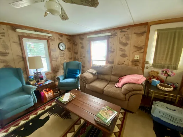 a view of a workspace with furniture