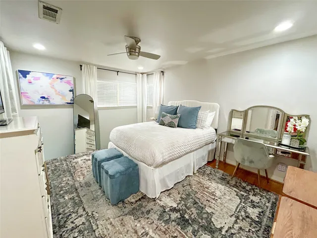 a bathroom with a shower sink and mirror