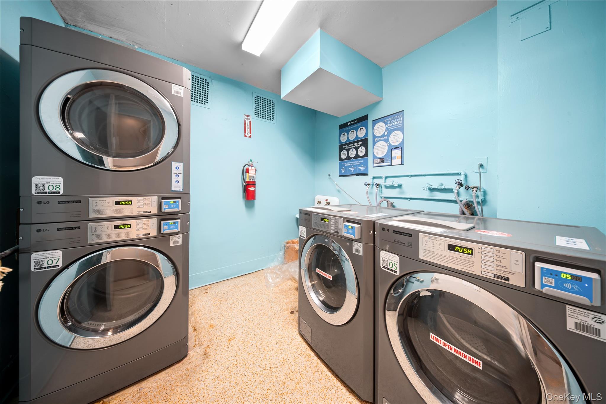 134-54 Maple Avenue, Unit 3W Queens, NY 11355 - Photo 18 of 19 Community laundry room with estacked washer and dryer