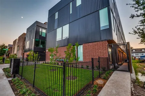 a view of street from balcony