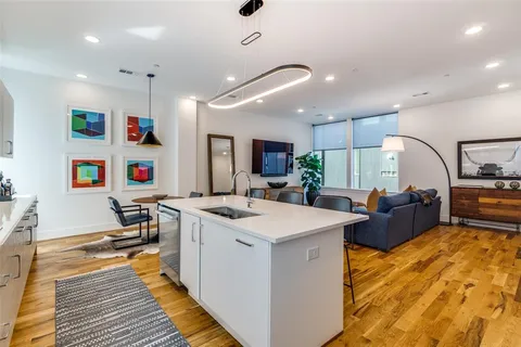 a view of kitchen center island and living room