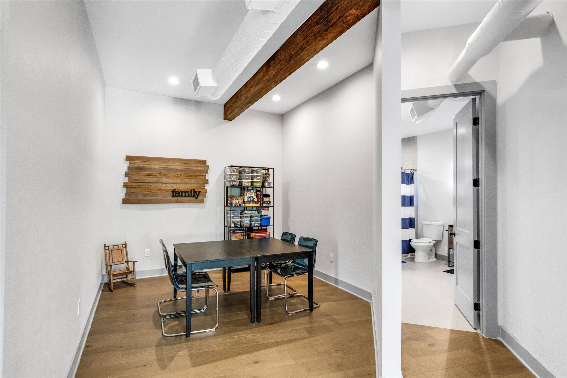 4227 Eck Lane Austin, TX 78734 - Photo 21 of 30 Dining space featuring beam ceiling, wood finished floors, and recessed lighting