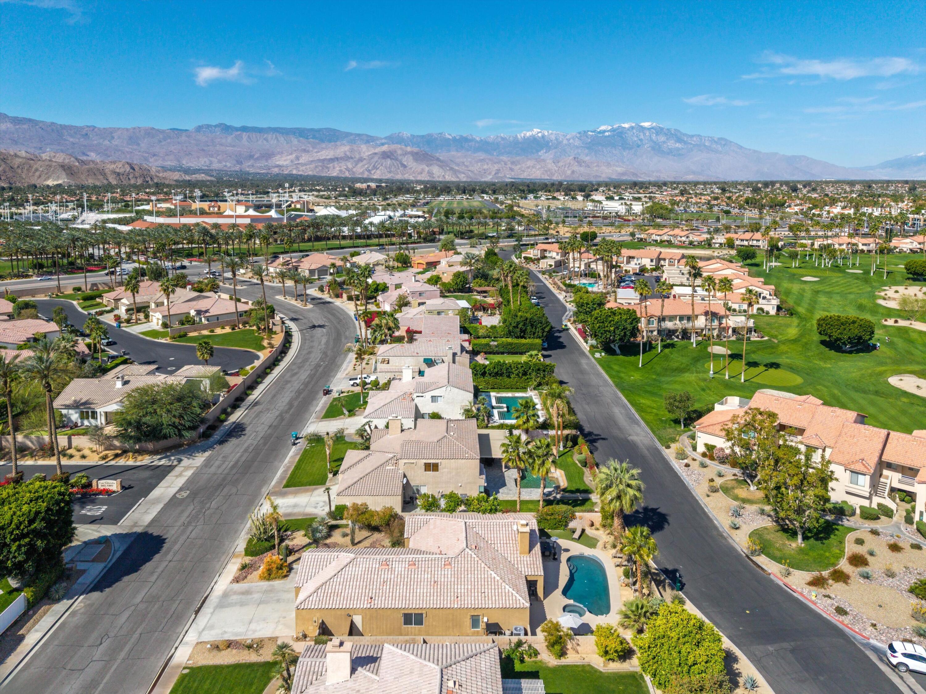 78330 Vía Sevilla La Quinta, CA 92253 - Photo 14 of 49 an aerial view of residential houses with outdoor space and swimming pool