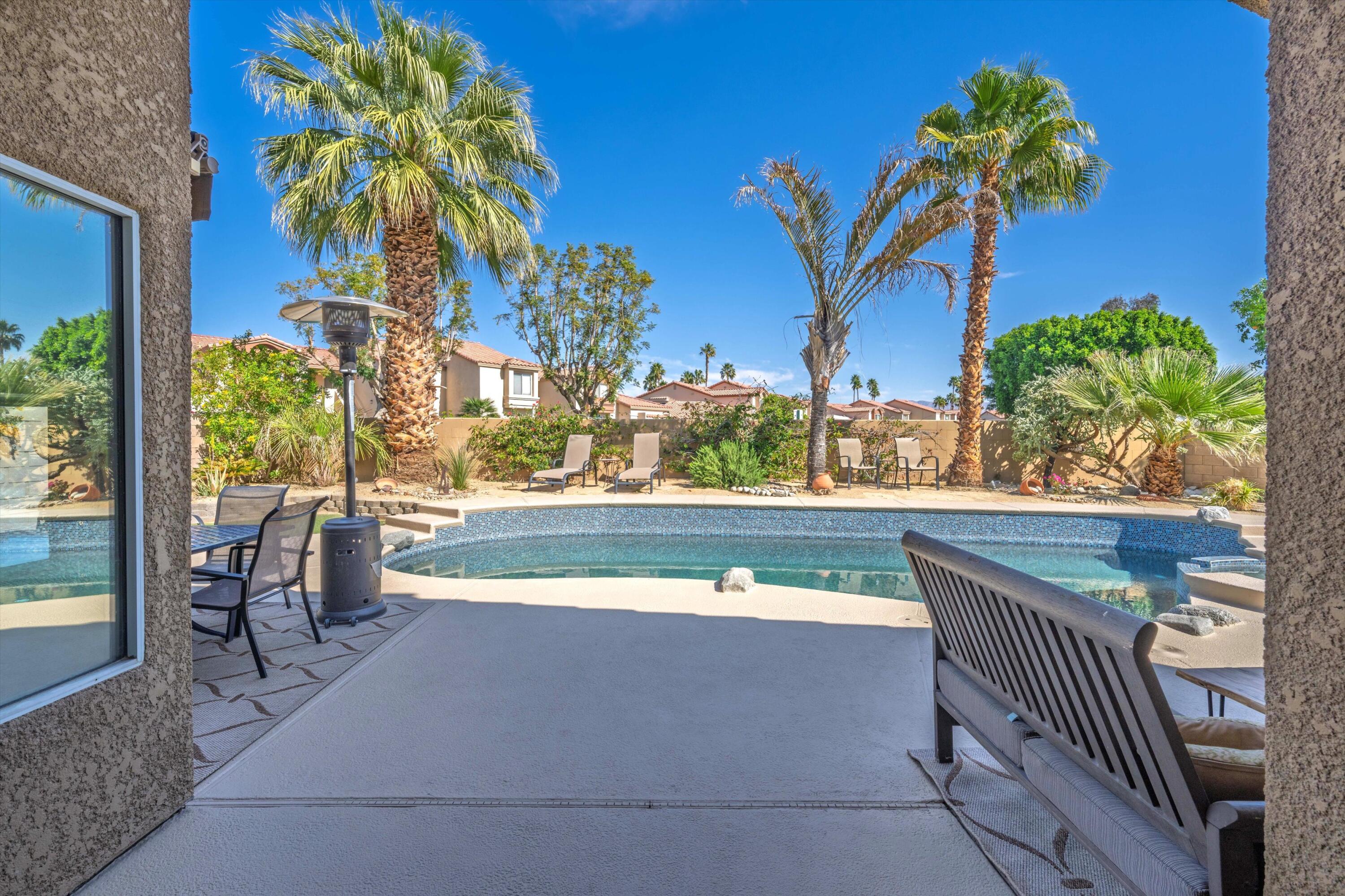 78330 Vía Sevilla La Quinta, CA 92253 - Photo 15 of 49 a view of a swimming pool with a patio