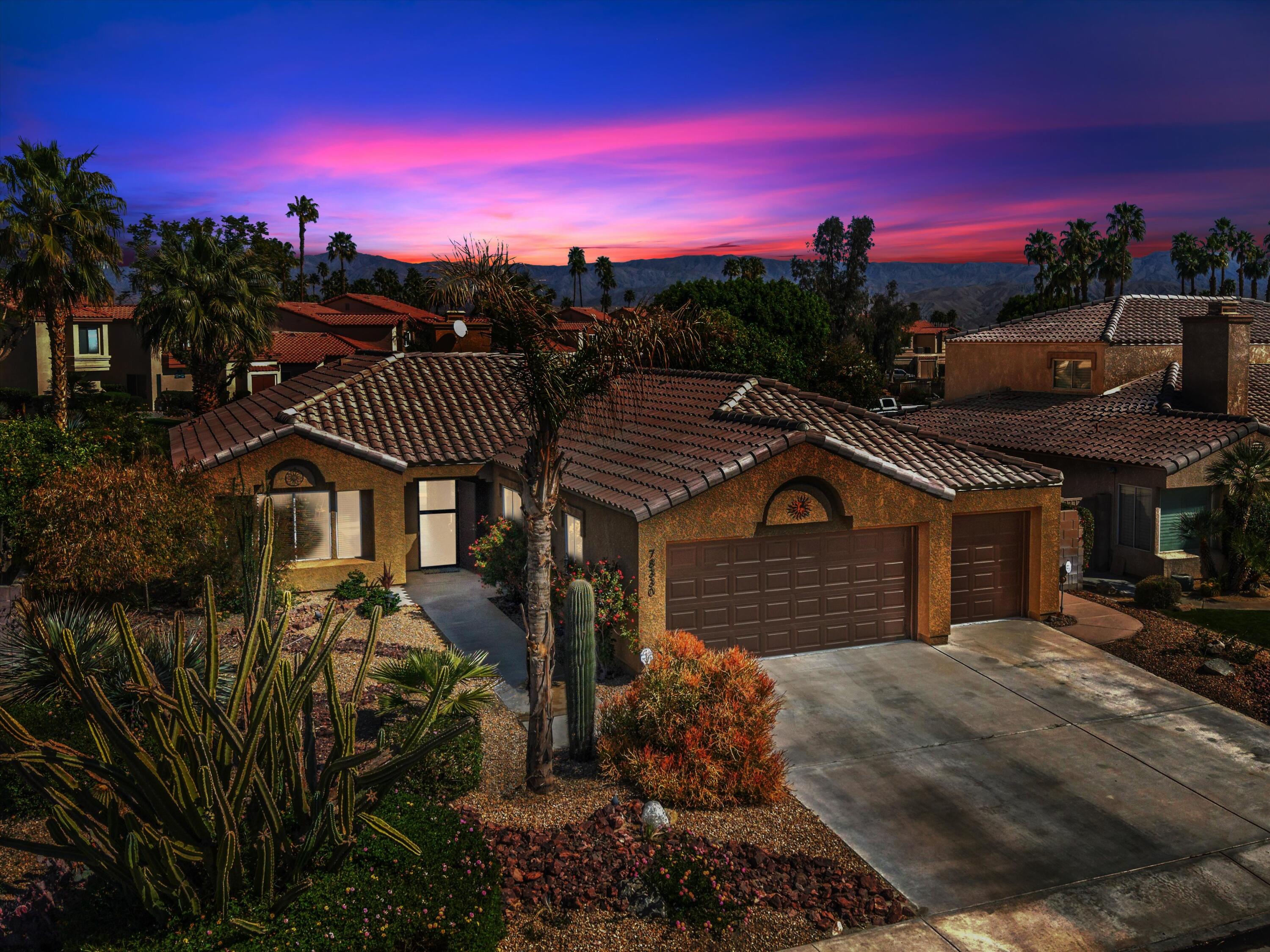 78330 Vía Sevilla La Quinta, CA 92253 - Photo 2 of 49 a view of a house with a yard