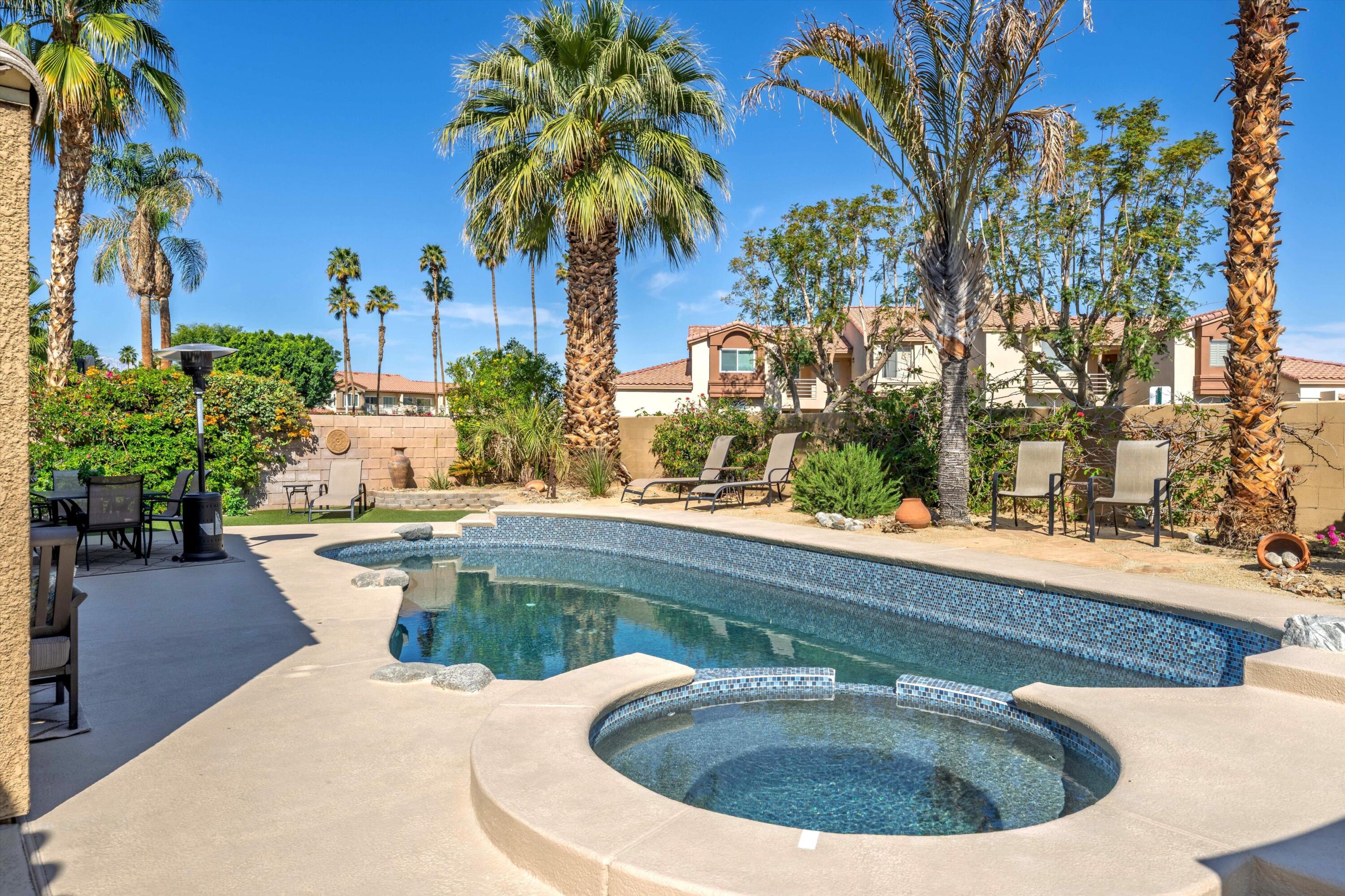 78330 Vía Sevilla La Quinta, CA 92253 - Photo 23 of 49 a view of a swimming pool with a patio