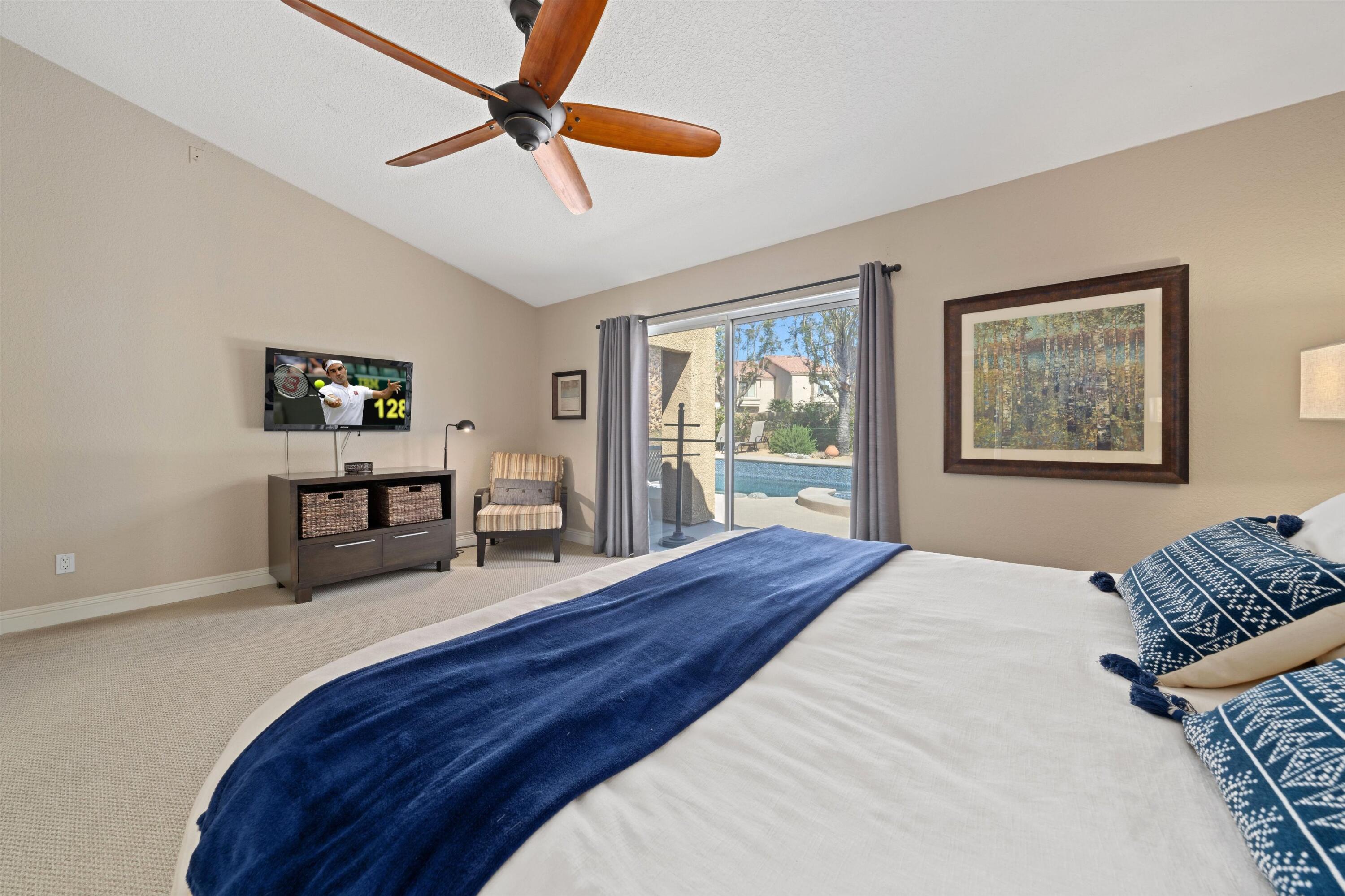 78330 Vía Sevilla La Quinta, CA 92253 - Photo 42 of 49 a bedroom with furniture and a window