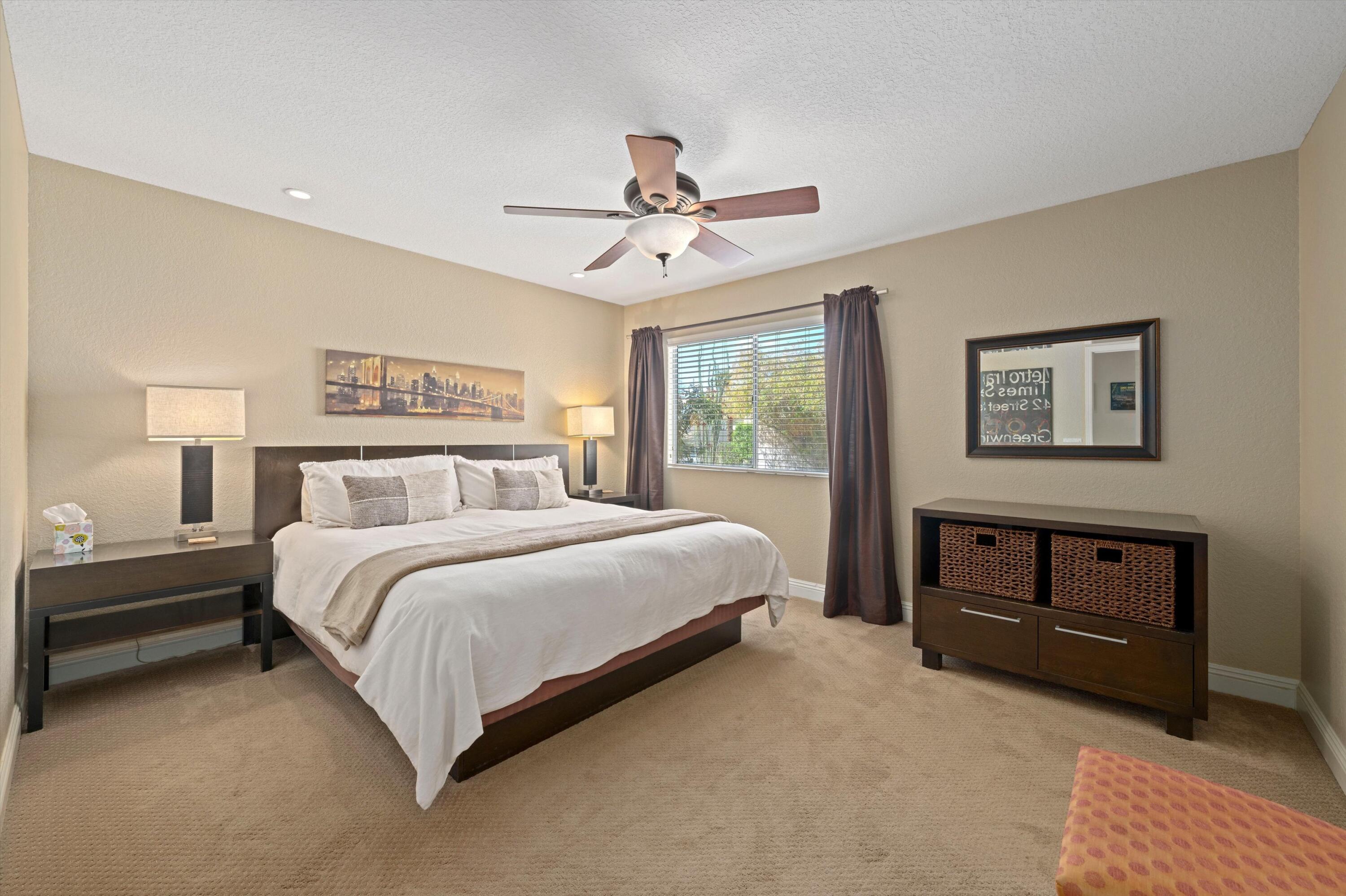78330 Vía Sevilla La Quinta, CA 92253 - Photo 45 of 49 a bedroom with a bed and a dresser