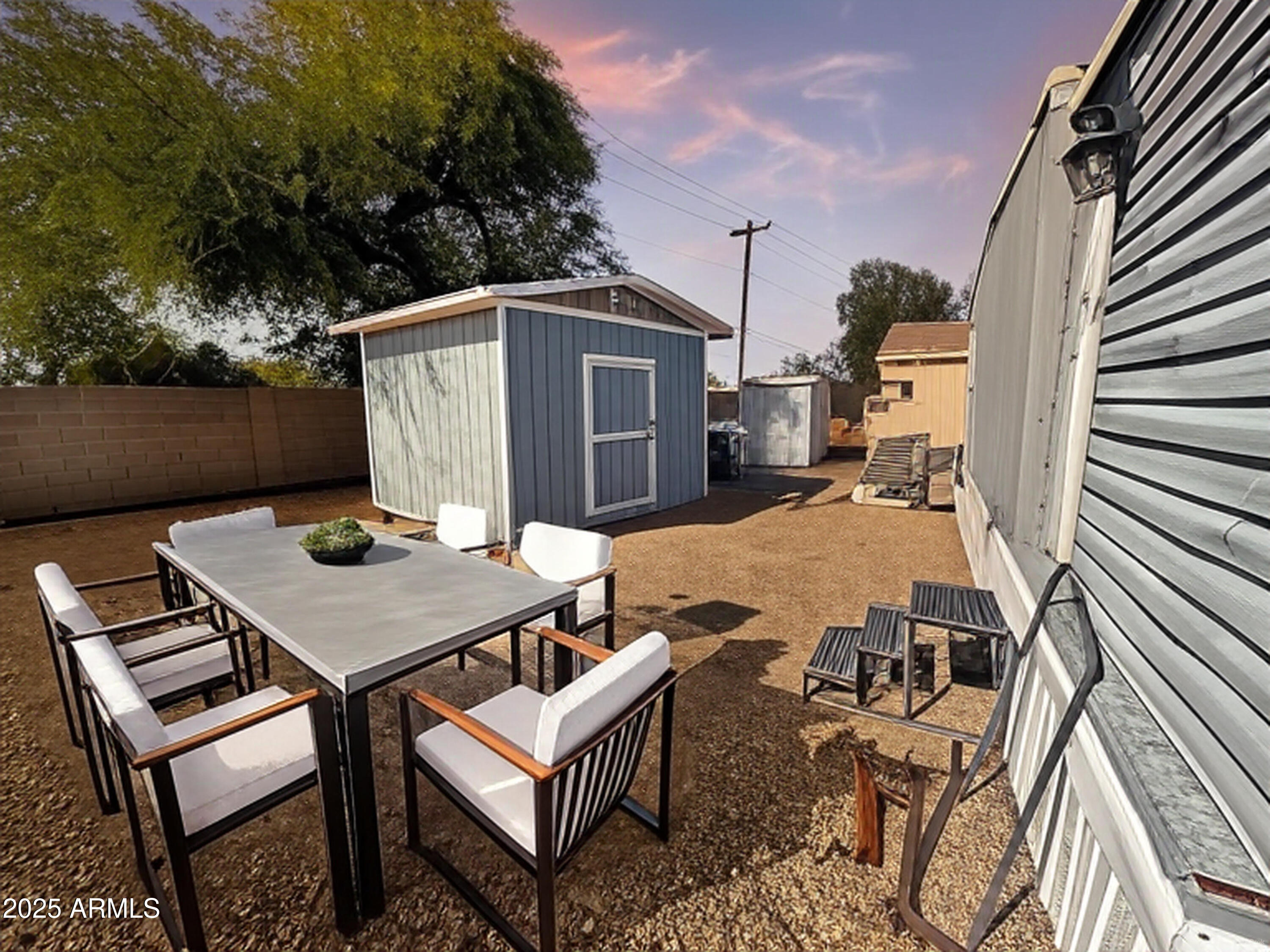 201 South Greenfield Road, Unit 18 Mesa, AZ 85206 - Photo 3 of 17 a terrace of a house with outdoor seating