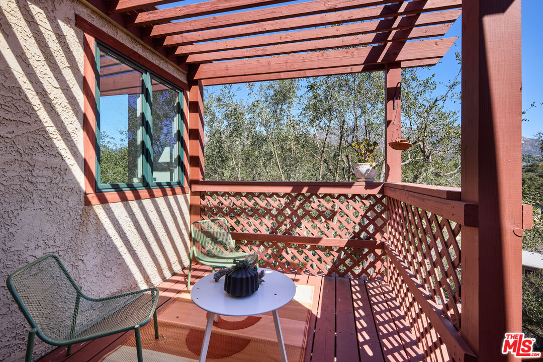 6948 St Estaban Street Tujunga, CA 91042 - Photo 24 of 26 a view of a chairs and table in the balcony