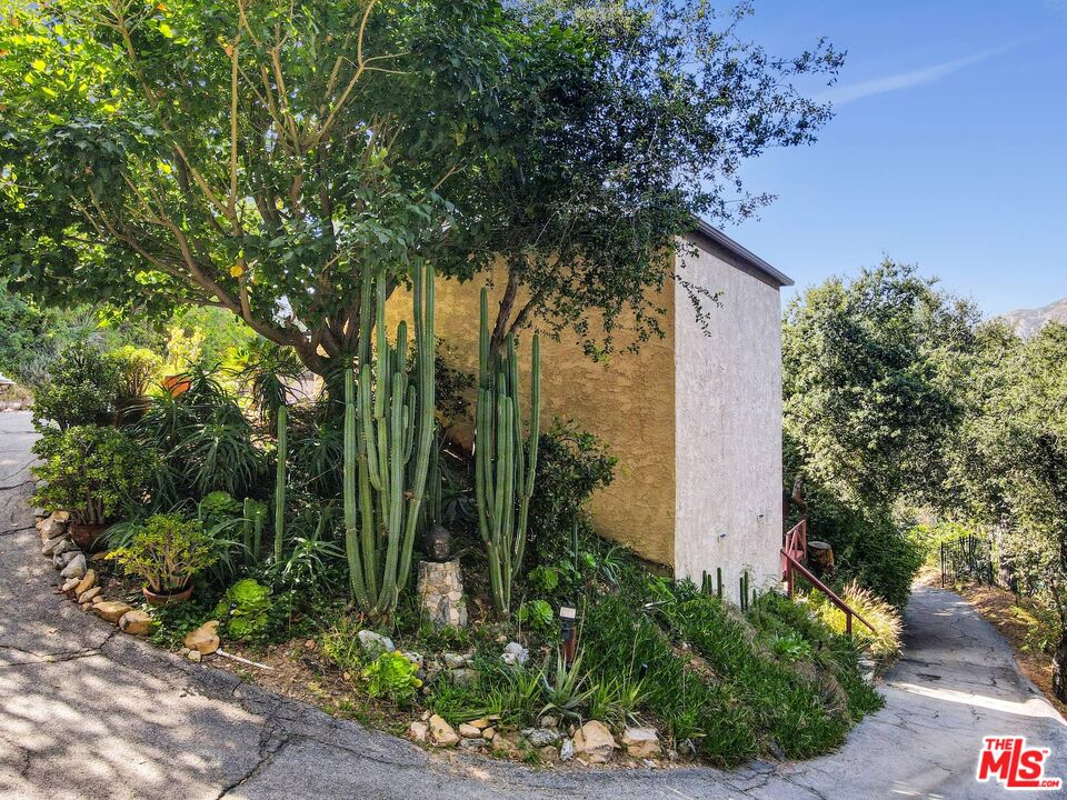 6948 St Estaban Street Tujunga, CA 91042 - Photo 25 of 26 a backyard of a house with lots of green space