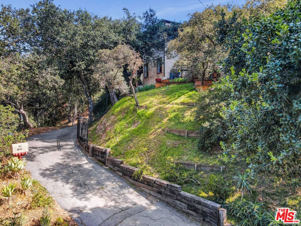 6948 St Estaban Street Tujunga, CA 91042 - Photo 26 of 26 a view of a garden with an empty room