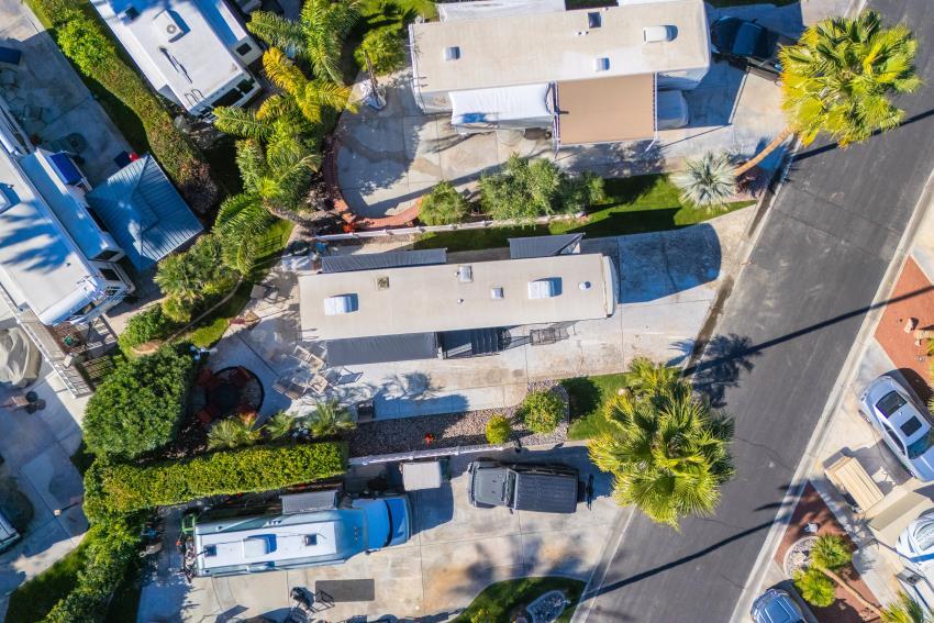 69411 Ramon Road, Unit 502 Cathedral City, CA 92234 - Photo 23 of 23 an aerial view of a house with a yard and garden