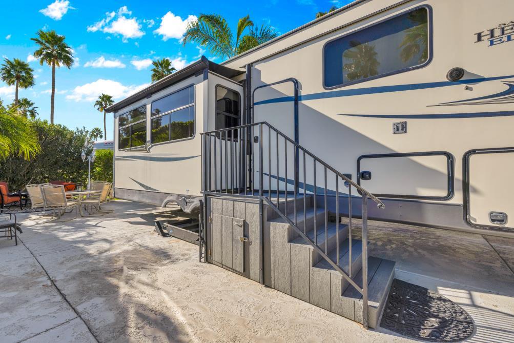 69411 Ramon Road, Unit 502 Cathedral City, CA 92234 - Photo 3 of 23 a view of a house with backyard and sitting area