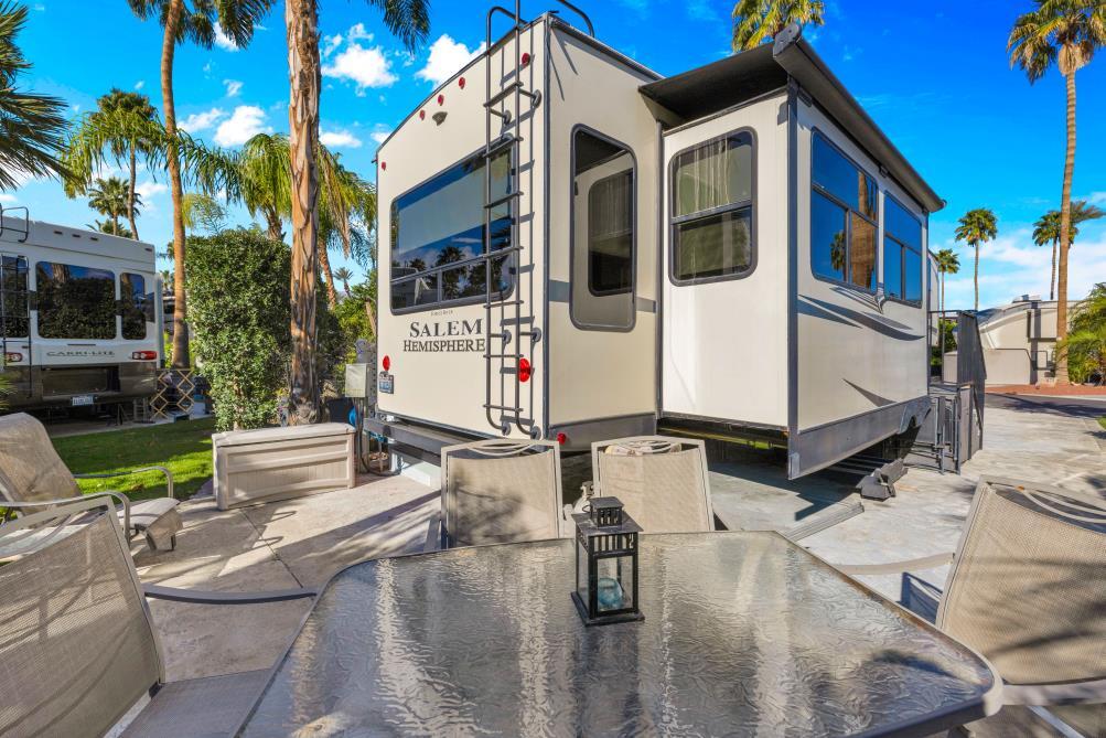 69411 Ramon Road, Unit 502 Cathedral City, CA 92234 - Photo 5 of 23 a view of a white building with many windows