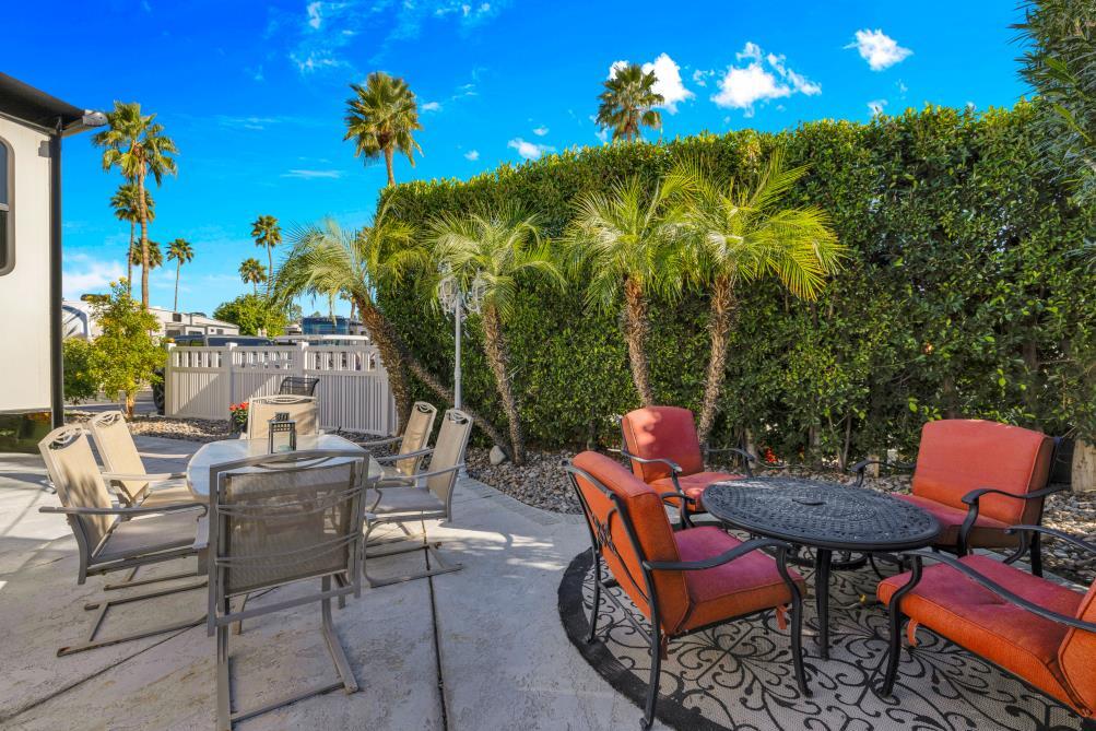 69411 Ramon Road, Unit 502 Cathedral City, CA 92234 - Photo 9 of 23 a outdoor living space with furniture and city view