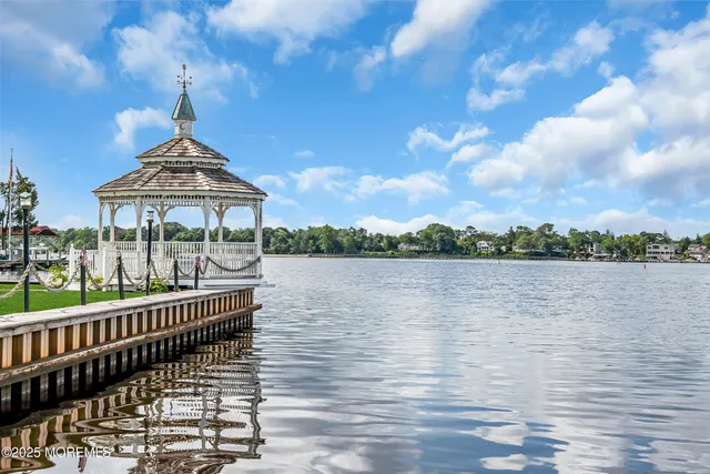 a kitchen with stainless steel appliances granite countertop a sink and a cabinets