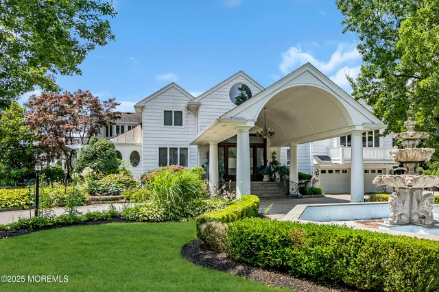 a view of a garden with a lake view