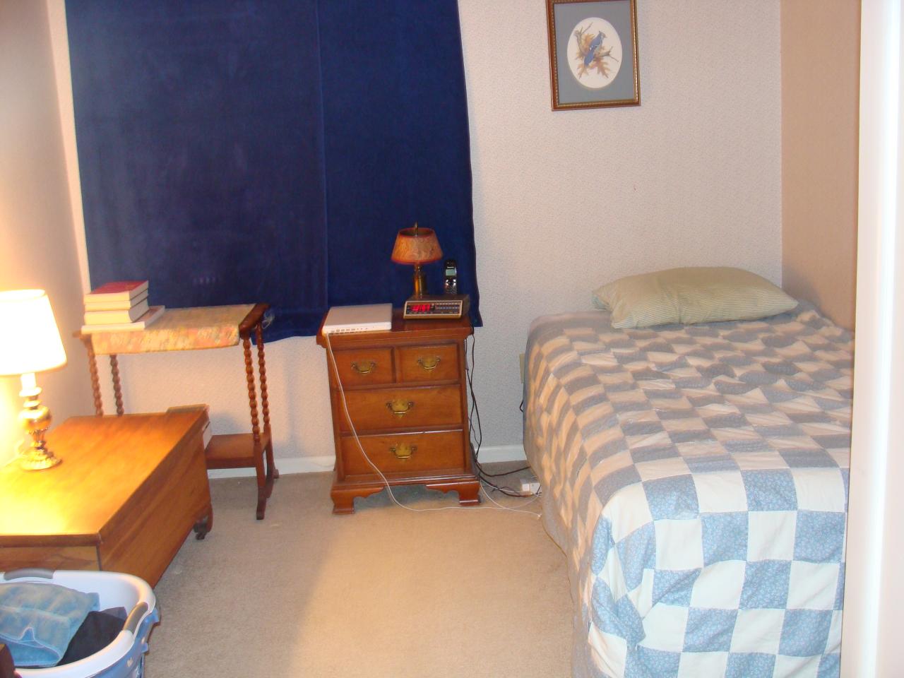 3 Cherry Hill Road Stockbridge, MA 01262 - Photo 9 of 17 a bedroom with a bed and a table in it