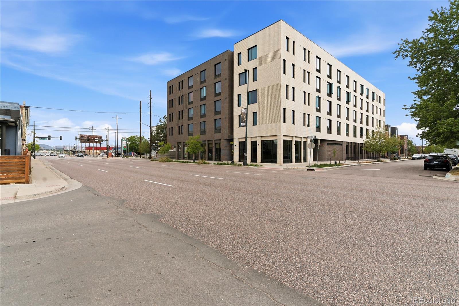603 Inca Street, Unit 330 Denver, CO 80204 - Photo 1 of 18 a view of a building with a street