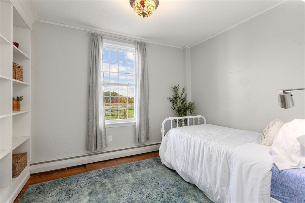 50 Tower Hill Road Brimfield, MA 01010 - Photo 21 of 40 a bedroom with a bed and a window