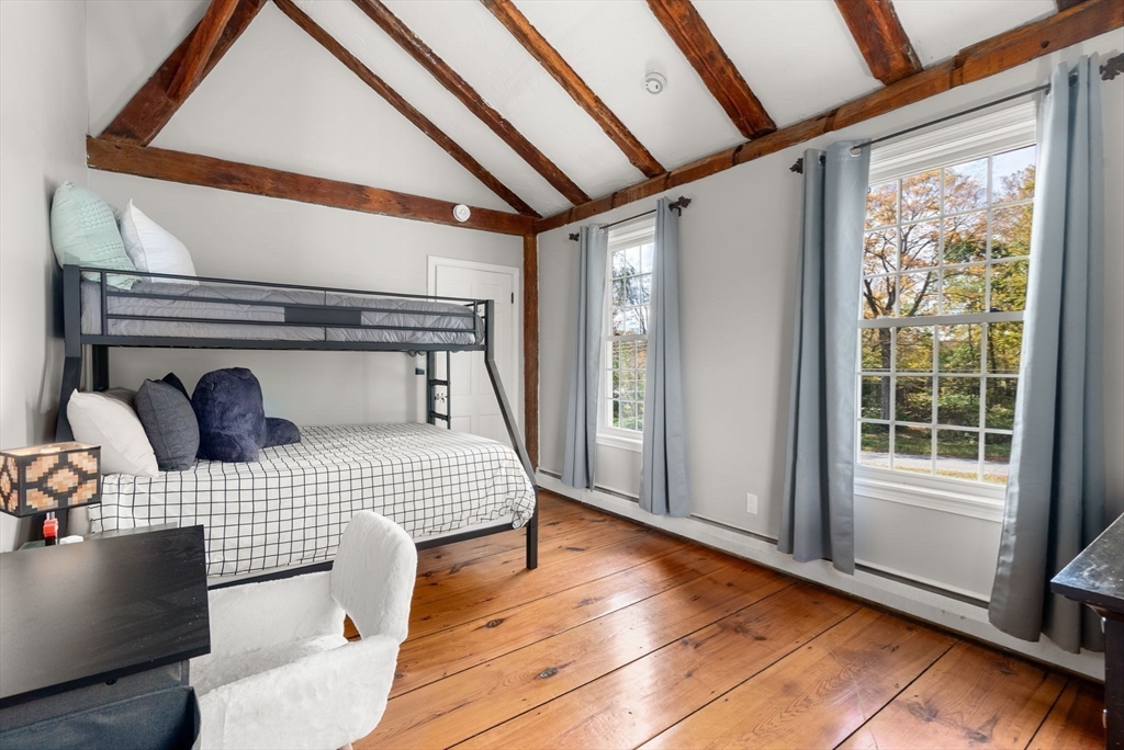 50 Tower Hill Road Brimfield, MA 01010 - Photo 27 of 40 a bedroom with a bed and wooden floor