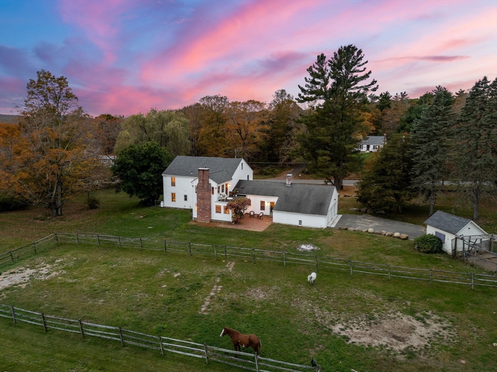 50 Tower Hill Road Brimfield, MA 01010 - Photo 38 of 40 a backyard of a house with table and chairs