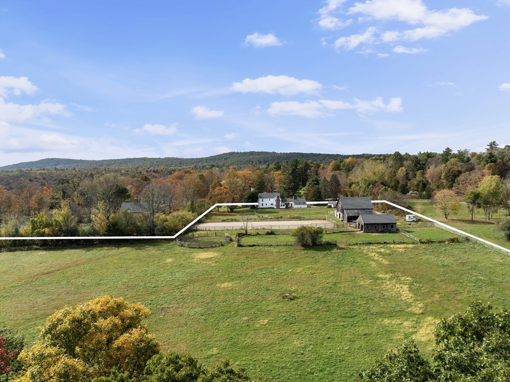 50 Tower Hill Road Brimfield, MA 01010 - Photo 4 of 40 a view of a lake with a mountain