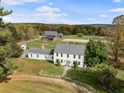 a view of a city with lawn chairs