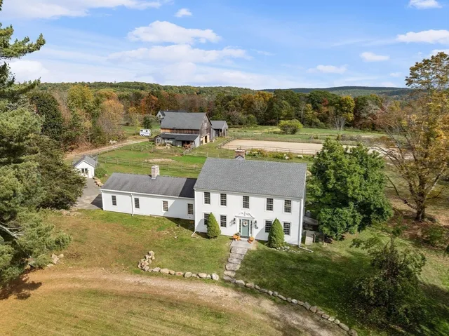 a view of a city with lawn chairs