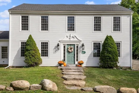 a front view of house with yard