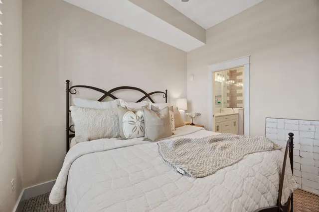 a view of a balcony with chair and wooden floor