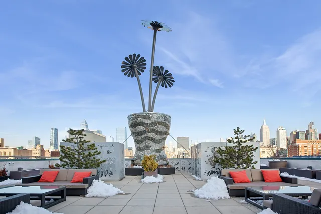 a room with lots of furniture and wooden floor