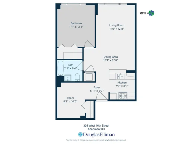 a front view of a building with lot of cars and trees