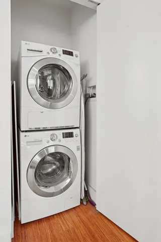 a bathroom with a multi story window and couch