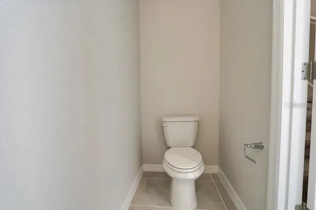 a bathroom with a toilet and a sink