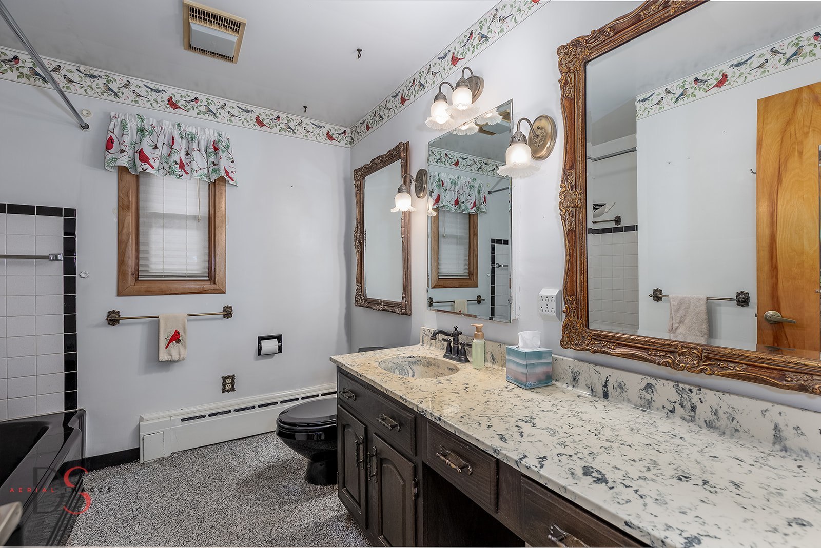 3476 East 27th Road Marseilles, IL 61341 - Photo 17 of 32 a bathroom with a granite countertop sink a large mirror and a shower