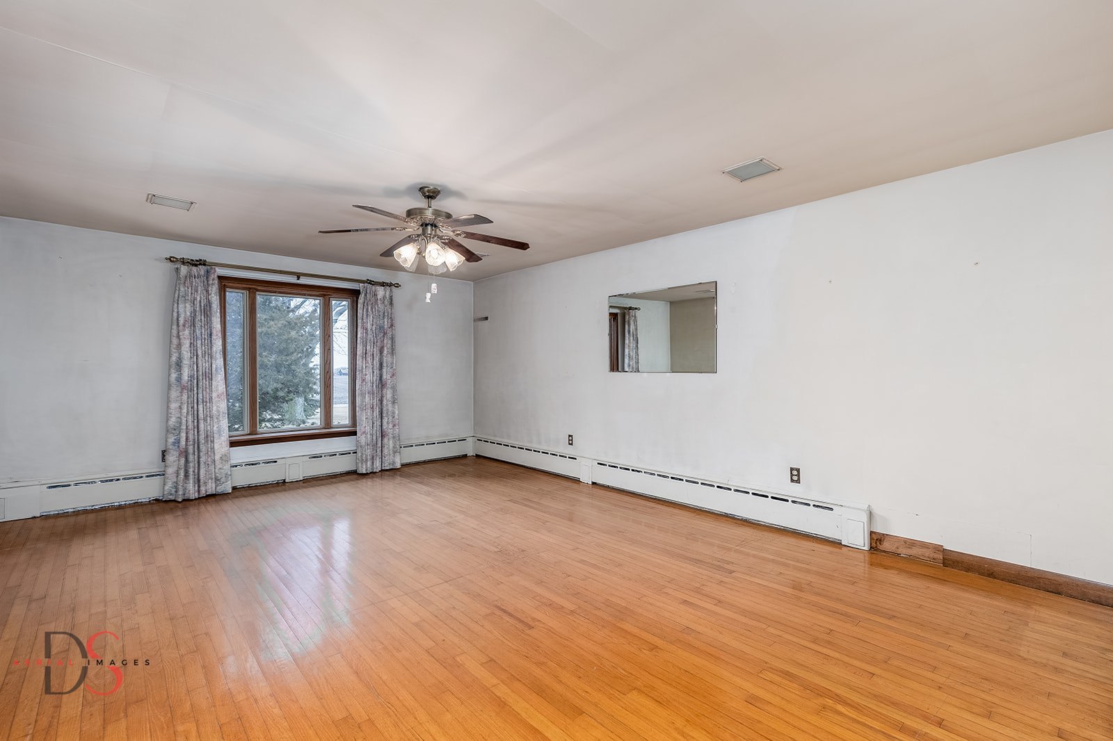 3476 East 27th Road Marseilles, IL 61341 - Photo 24 of 32 a view of an empty room with wooden floor and a window