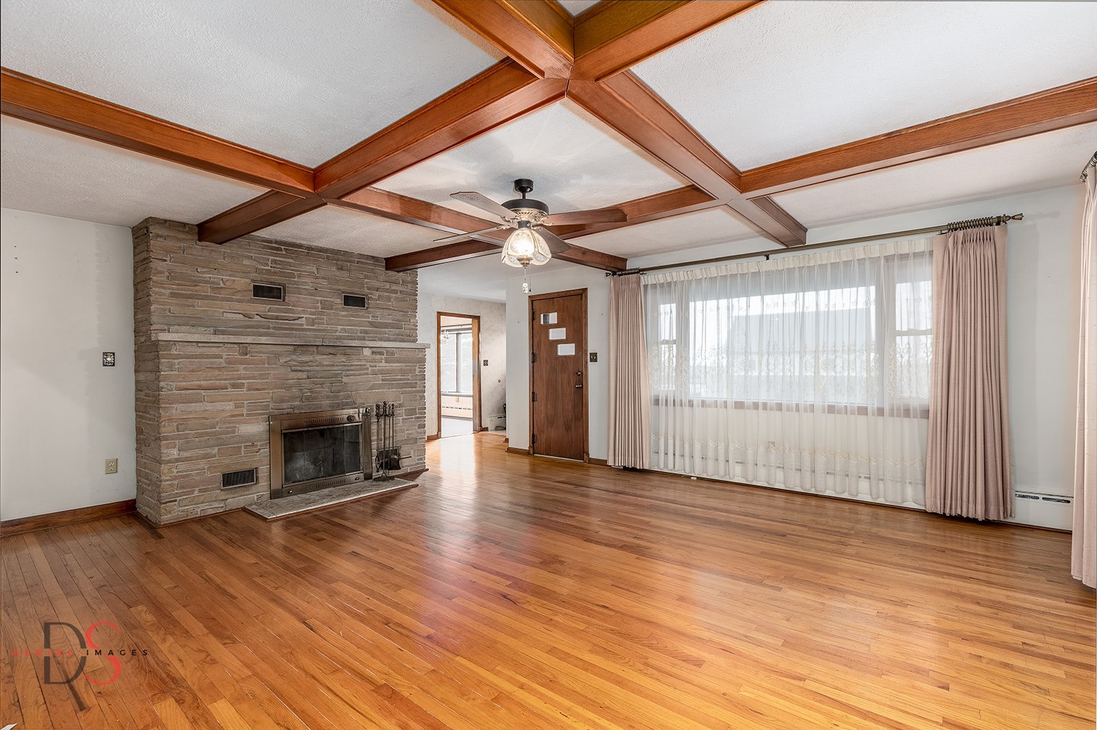 3476 East 27th Road Marseilles, IL 61341 - Photo 26 of 32 a view of empty room with wooden floor and fireplace