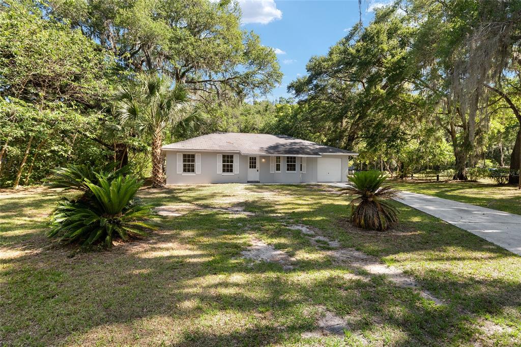 4329 Northwest 155th Street Reddick, FL 32686 - Photo 5 of 52 a view of a house with a yard