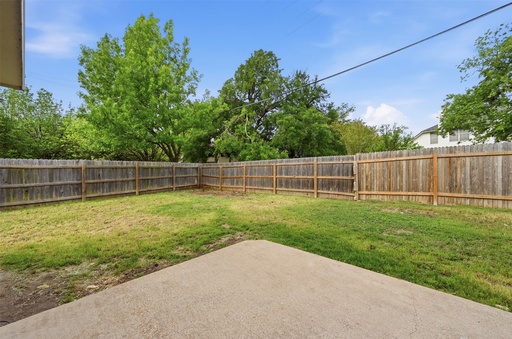 3629 Ruby Red Drive Austin, TX 78728 - Photo 28 of 34 Fenced backyard with a patio area