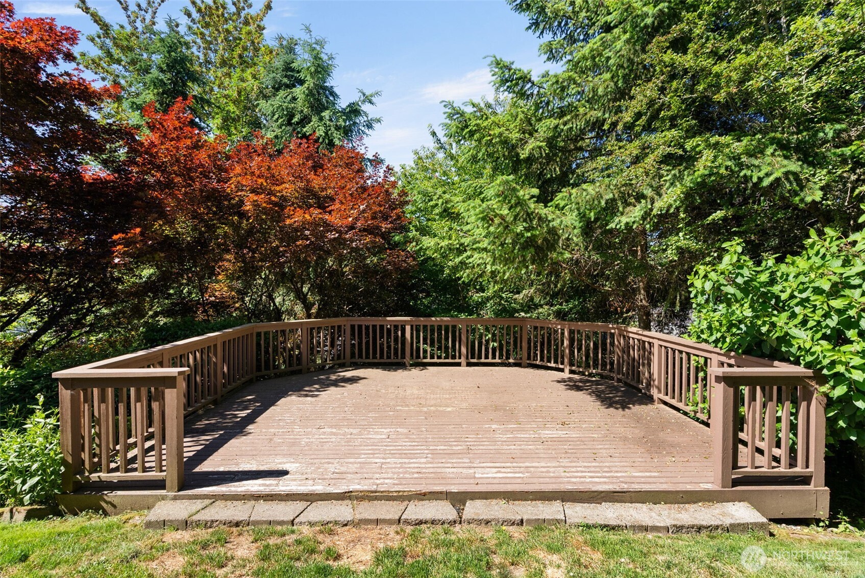 26227 Montera Loop Northeast Kingston, WA 98346 - Photo 20 of 22 a view of house with backyard and entertaining space