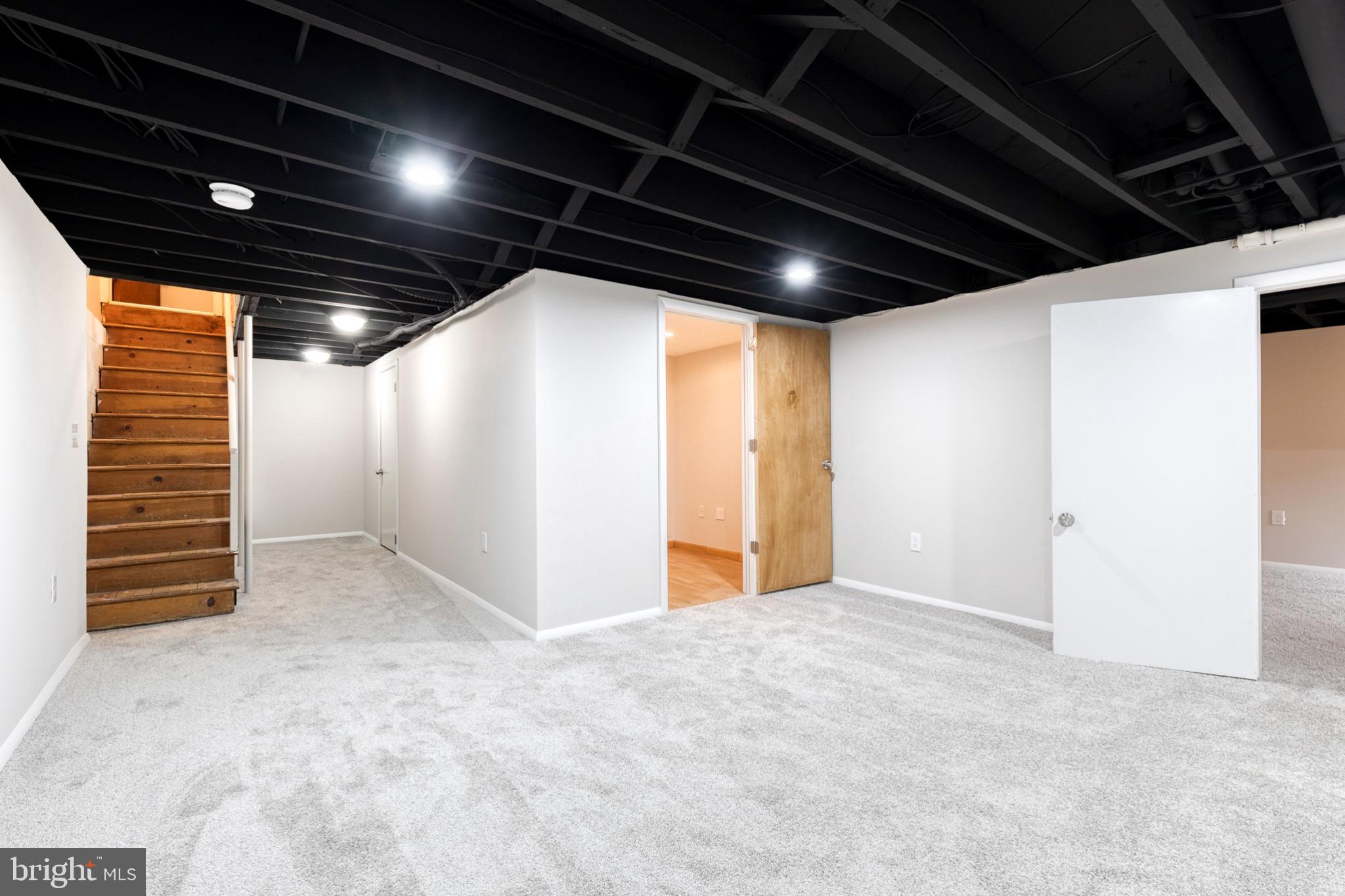 8306 Berkfield Road Baltimore, MD 21237 - Photo 18 of 29 Spacious, versatile fully finished basement.