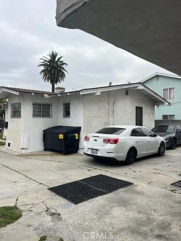 a view of parking with cars parked