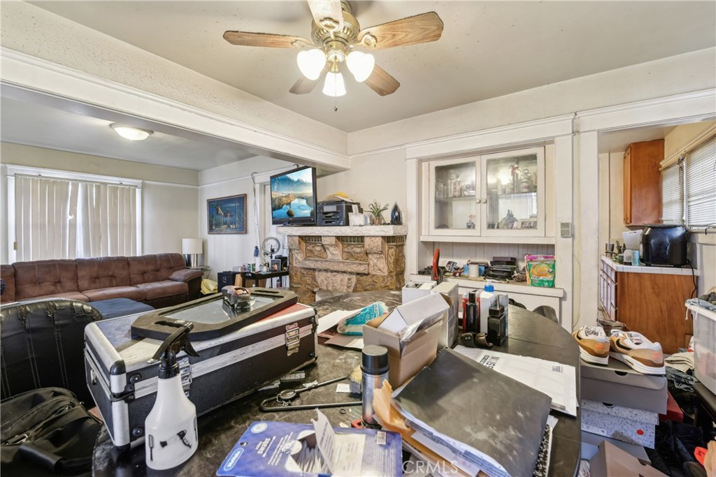 231 West 88th Street Los Angeles, CA 90003 - Photo 4 of 15 a living room with furniture and a window