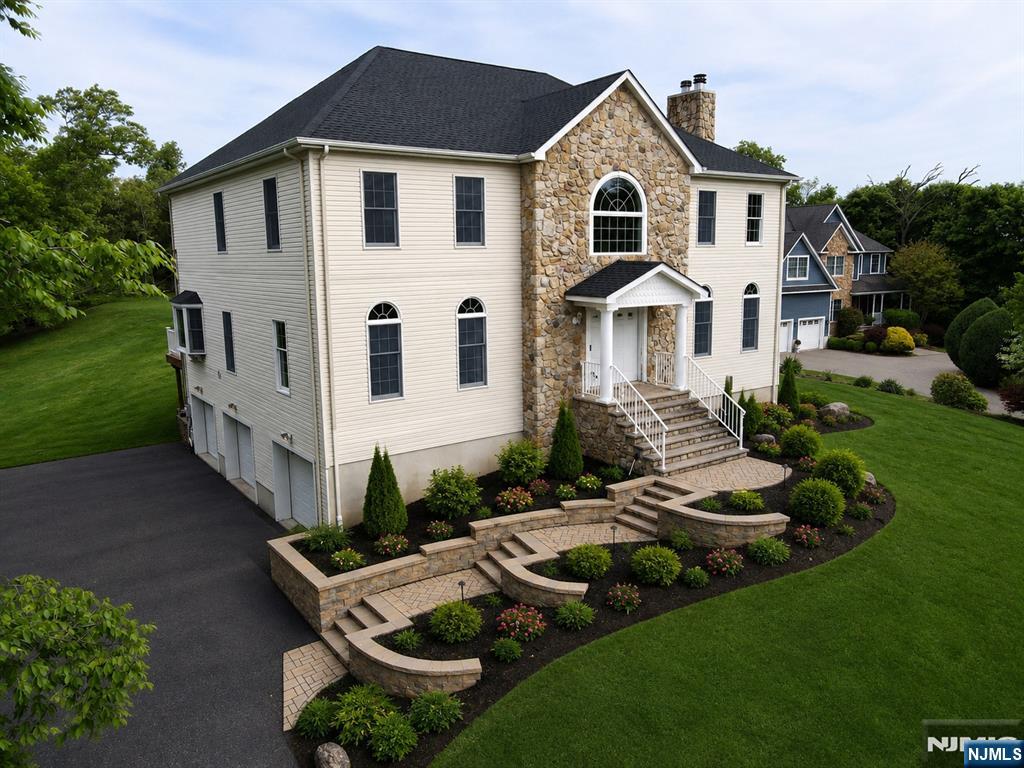 40 Horseneck Road Montville, NJ 07045 - Photo 1 of 47 a front view of a house with garden