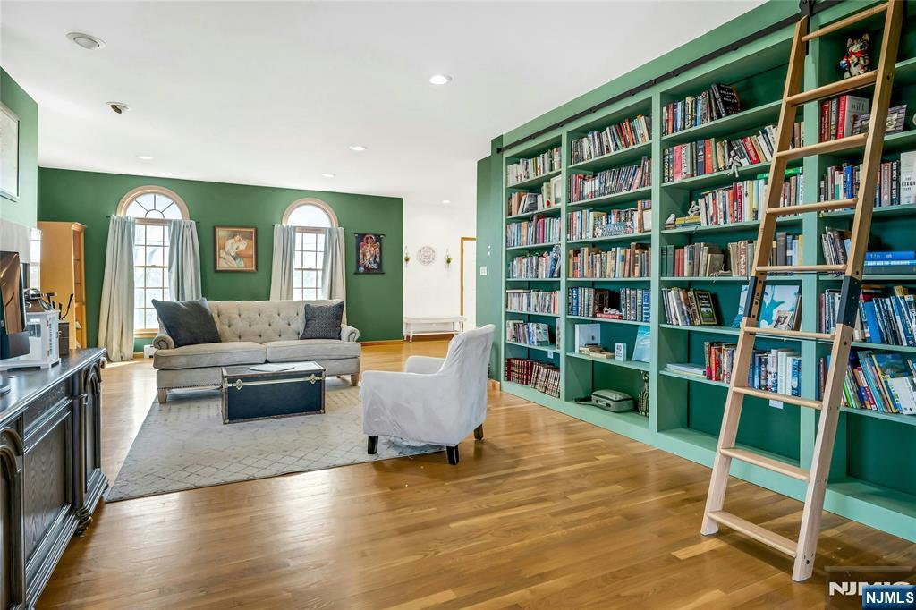 40 Horseneck Road Montville, NJ 07045 - Photo 12 of 47 a living room with furniture and a book shelf