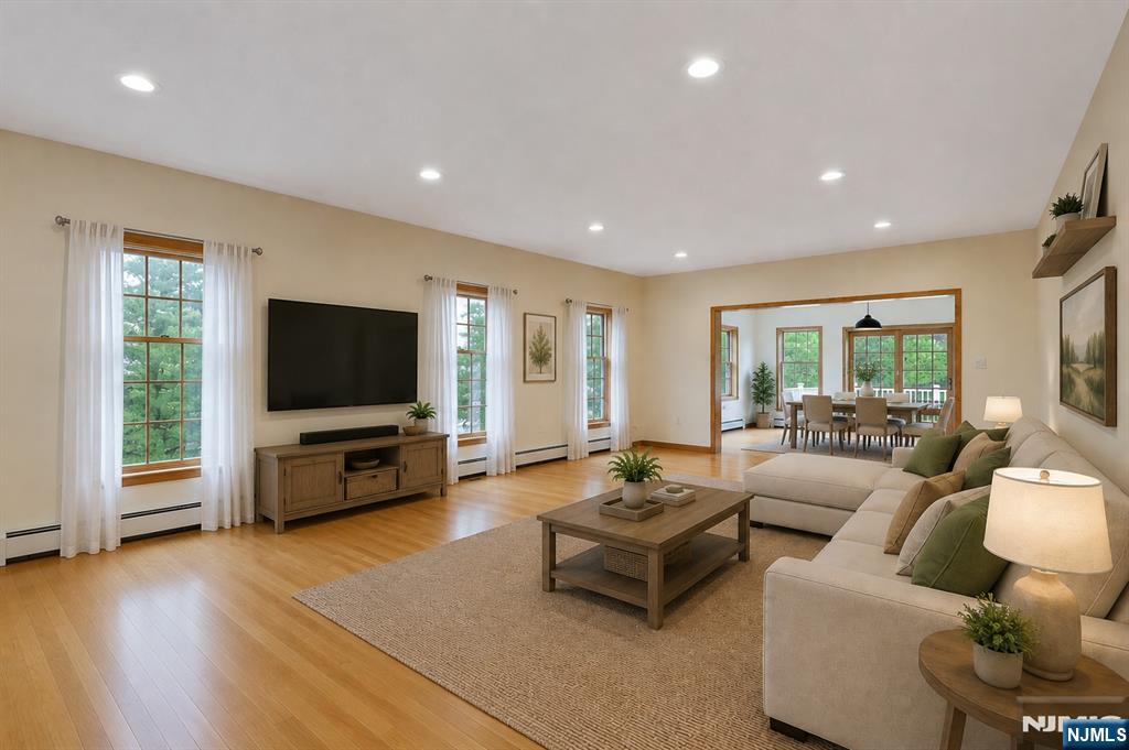 40 Horseneck Road Montville, NJ 07045 - Photo 19 of 47 a living room with furniture and a flat screen tv